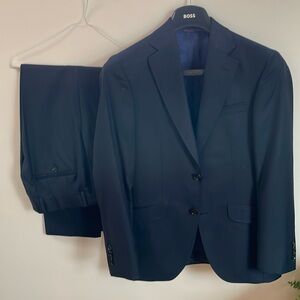 Beautiful dark blue suit, worn once and dry cleaned